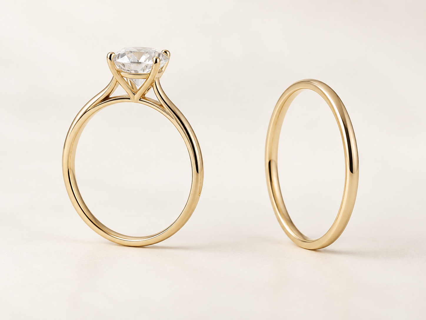 AI illustration of separate ring side profiles showing a raised setting beside a plain band.