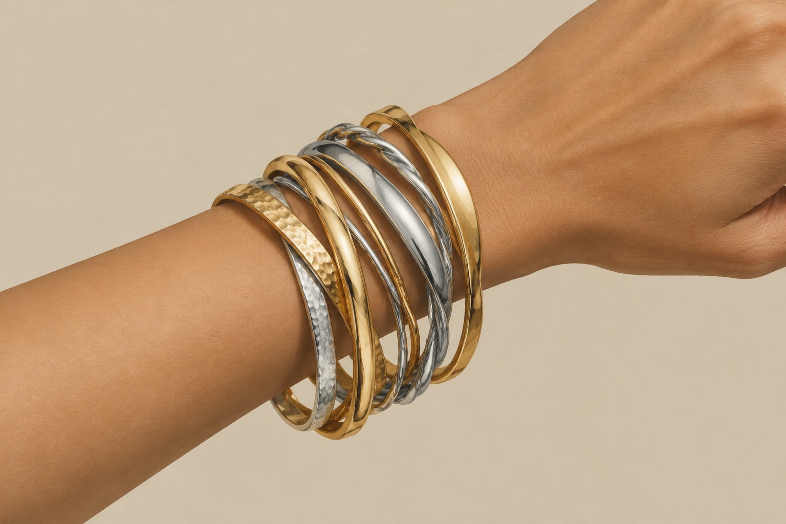 Illustration of stacked gold and silver bangles (AI illustration, not a Shewah product)