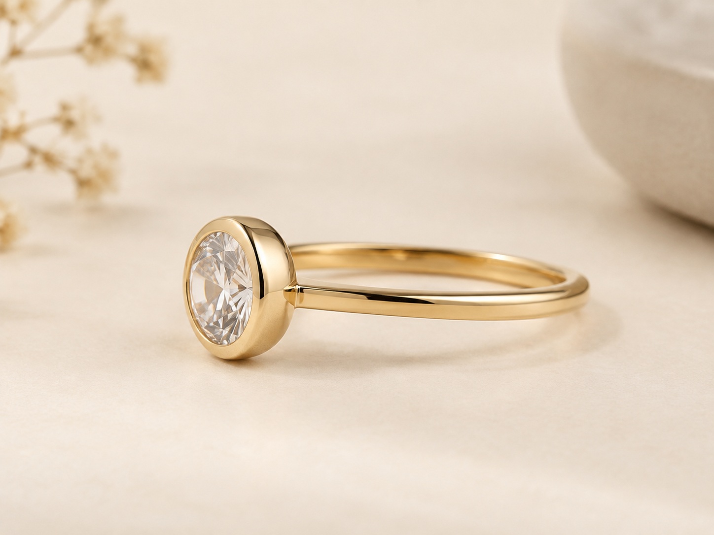 AI illustration showing a continuous bezel rim around a solitaire-style stone.
